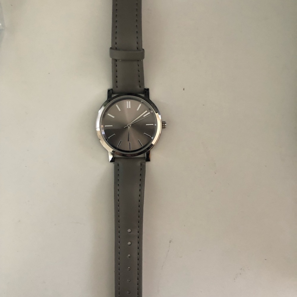Grey/silver watch. Barely worn.